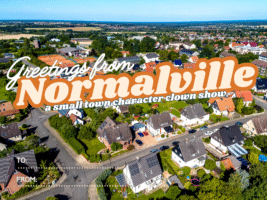 A postcard-style image shows an aerial view of a suburban town with houses, trees, and fields. Large text reads Greetings from Normalville, a small town character clown show. Spaces for TO: and FROM: are at the bottom.